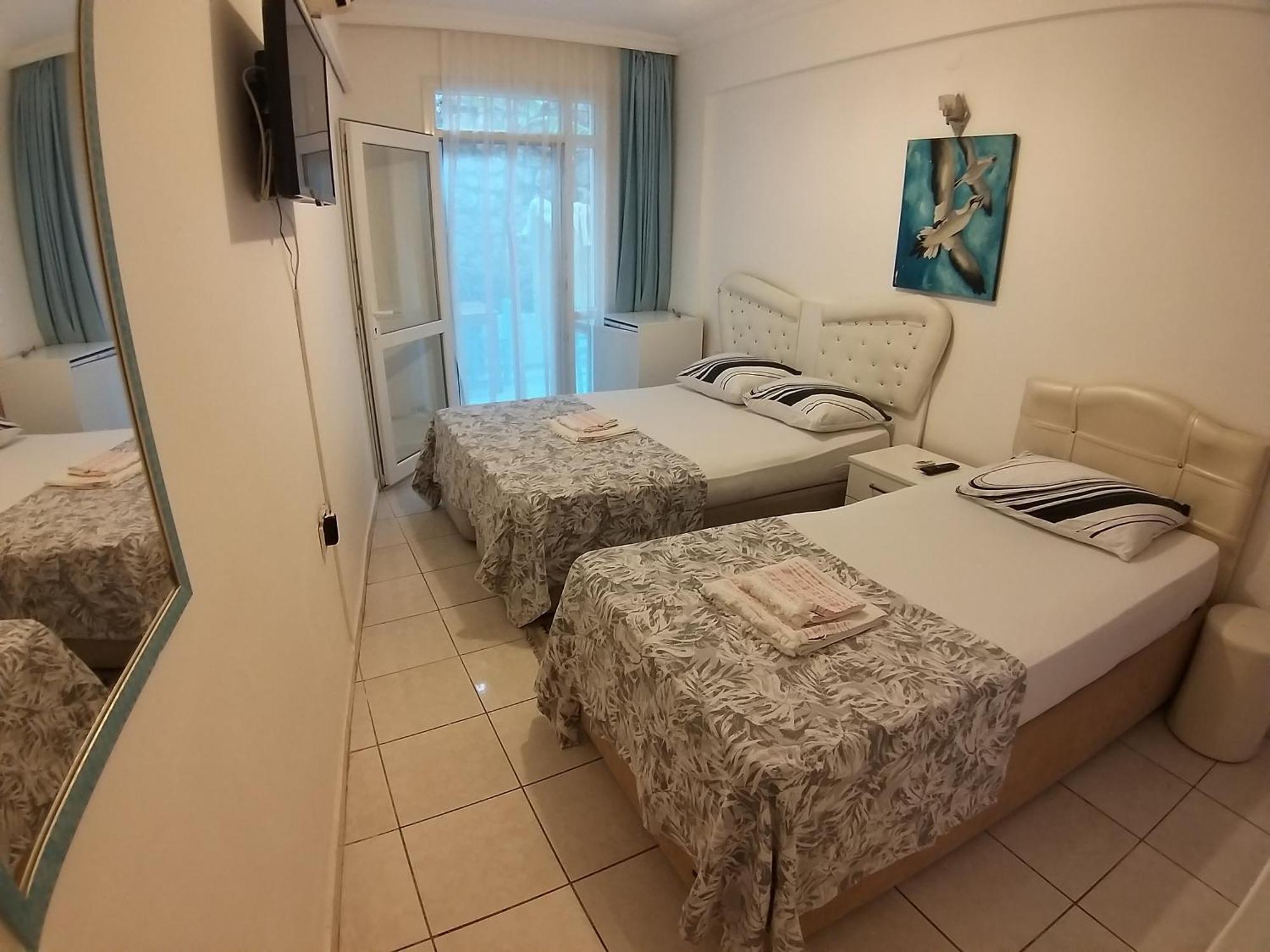 Beyaz Apart Pansiyon Çeşme المظهر الخارجي الصورة